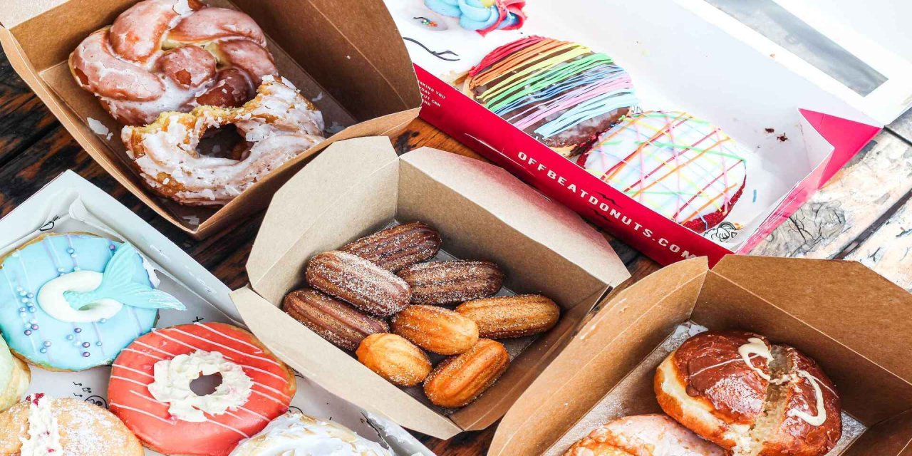 Sweet treats in boxes on table